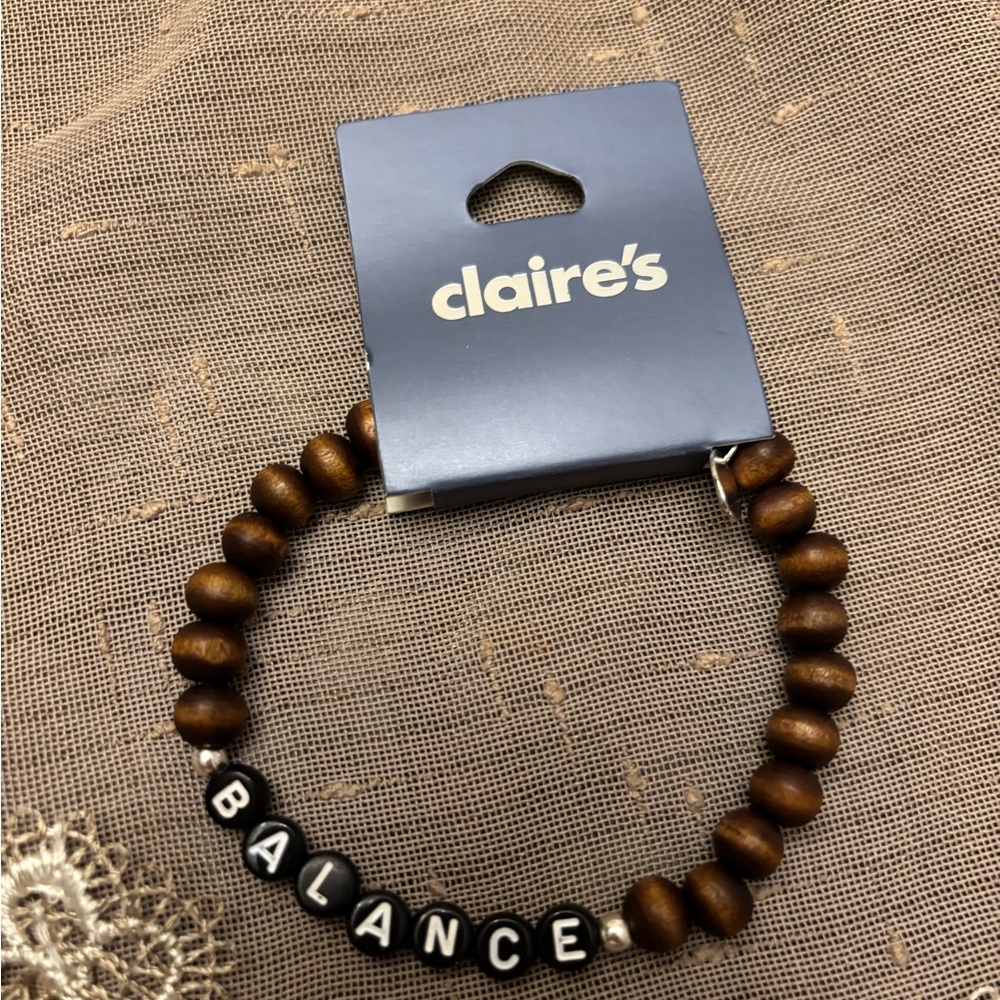 Claire's Brown Beaded Bracelet with Balance Charm